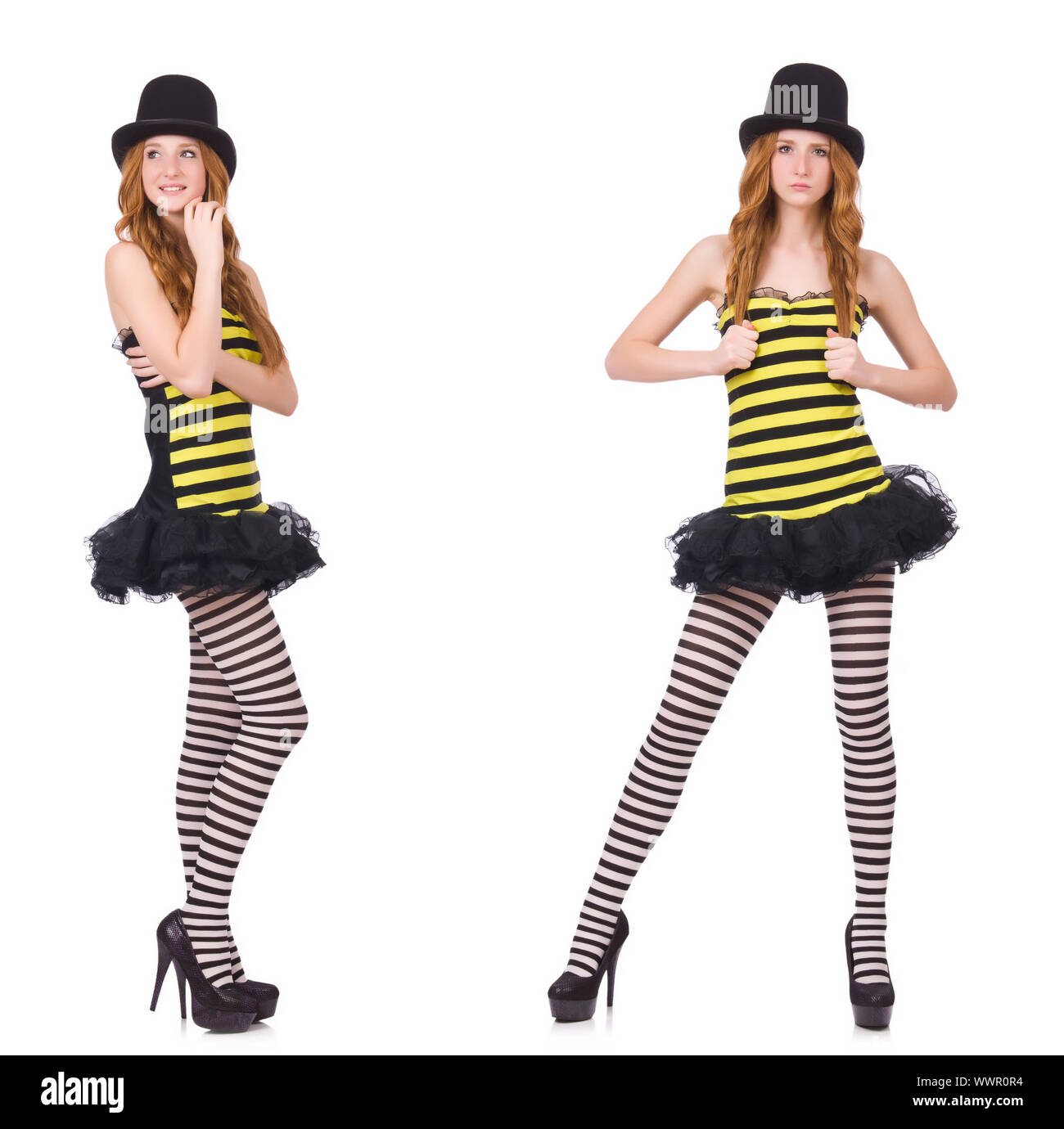 Una ragazza in nero e giallo listati dress isolato su bianco Foto Stock