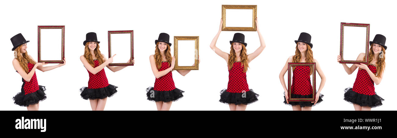 La bella ragazza in rosso polka dot dress con picture frame isolato su bianco Foto Stock