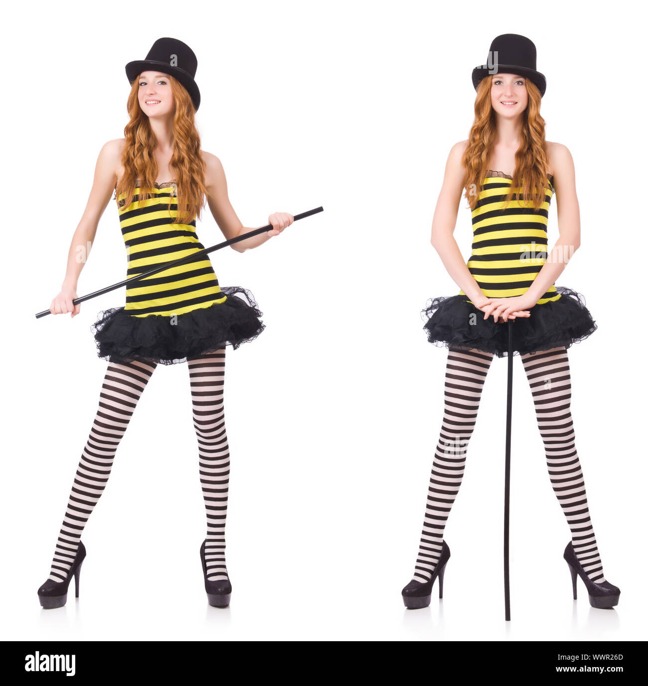 Una ragazza in nero e giallo listati dress isolato su bianco Foto Stock