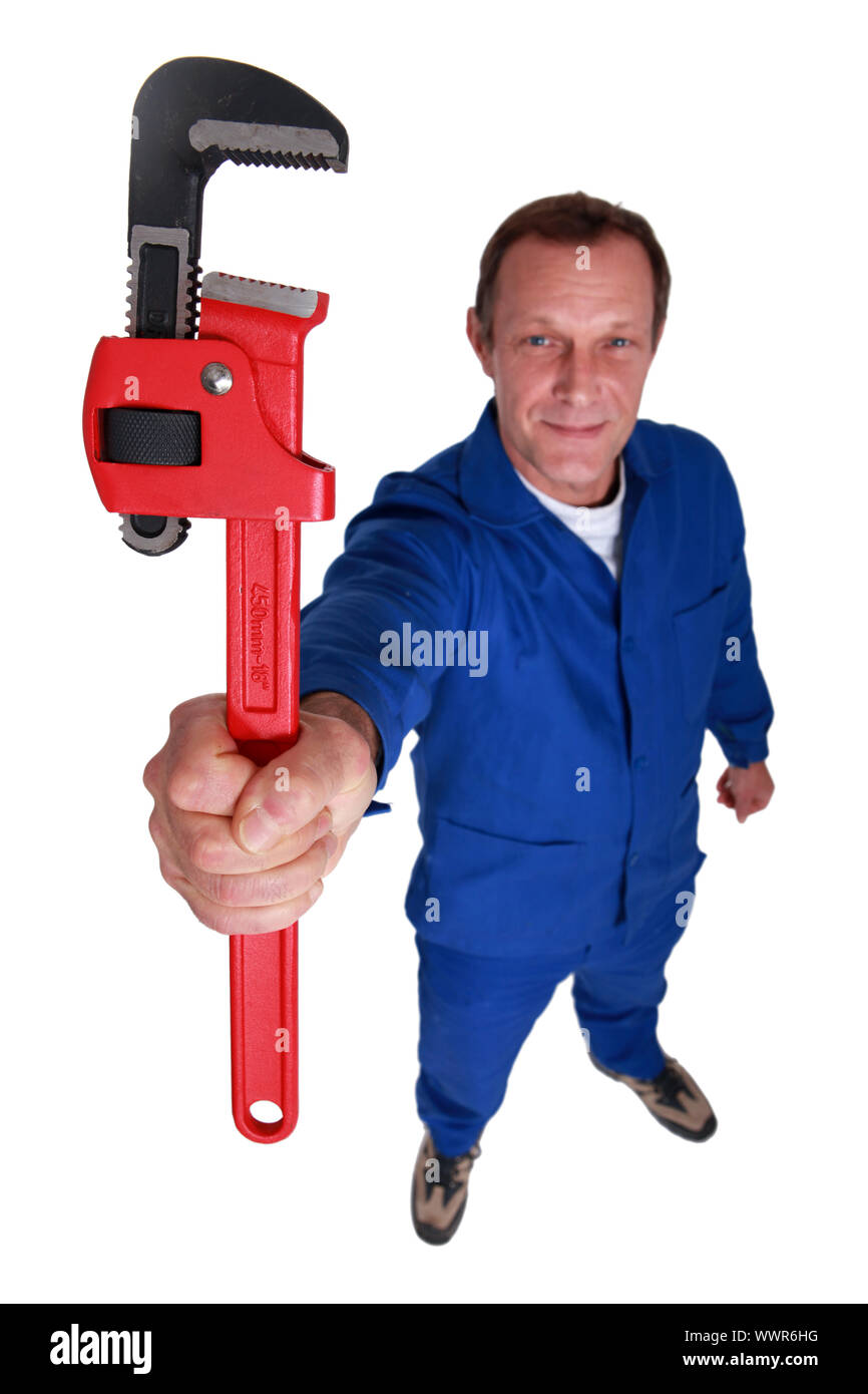 Lavoratore manuale con chiave Foto Stock