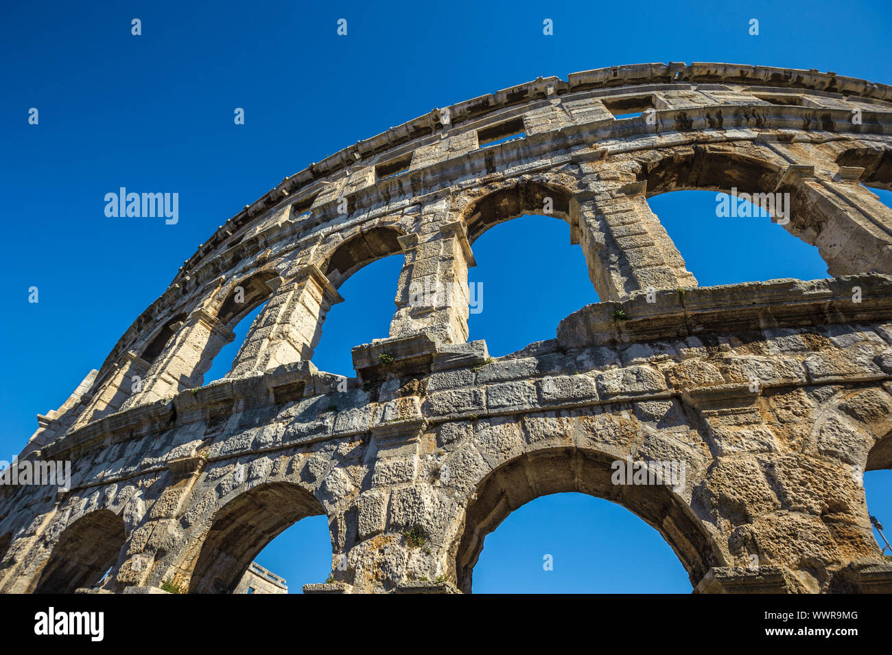 Antico anfiteatro romano a Pola, in Croazia. UNESCO - Sito Patrimonio dell'umanità. Foto Stock