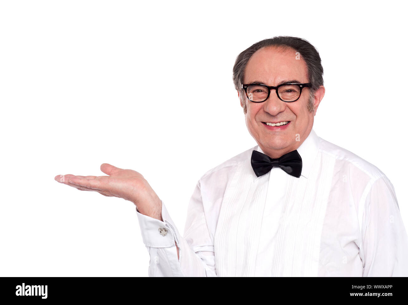 Elegante maschio senior in rappresentanza di copia spazio isolato contro uno sfondo bianco Foto Stock