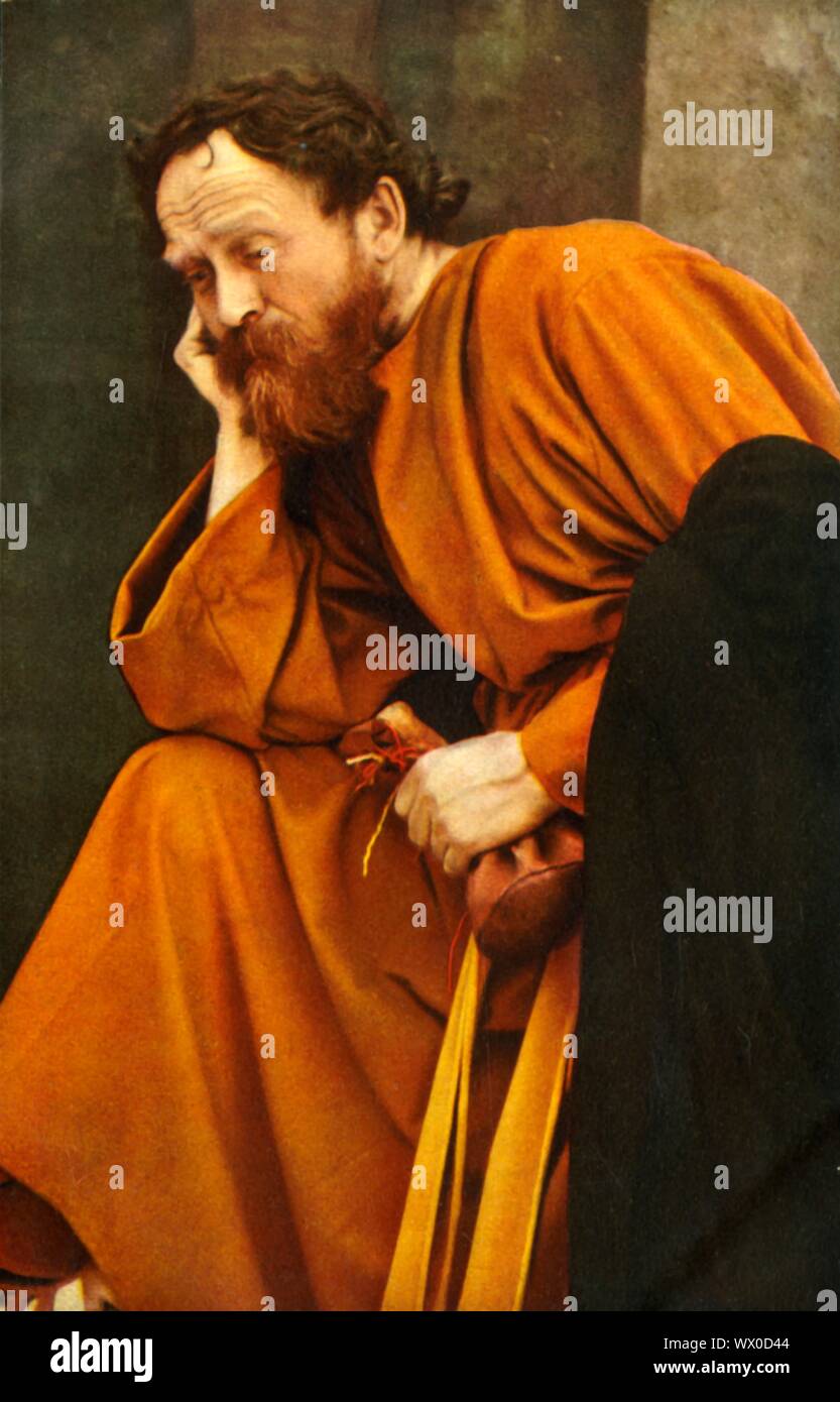 Giuda, 1922. Guido Mayr come Giuda con il portamonete contenente i trenta pezzi d'argento: il giocatore in Oberammergau Passion Play. Il gioco viene eseguito ogni dieci anni, su open-air stadi, dagli abitanti del villaggio di Oberammergau in Baviera, Germania. Andata in scena per la prima volta nel 1634, il gioco racconta la storia della passione di Gesù, che culmina nella sua crocifissione. La manifestazione è diventata un'attrazione turistica, con un pubblico proveniente da tutto il mondo. Cartolina ufficiale del 1922 Oberammergau Passion Play. [F. Bruckmann, Monaco di Baviera, Germania, 1922] Foto Stock