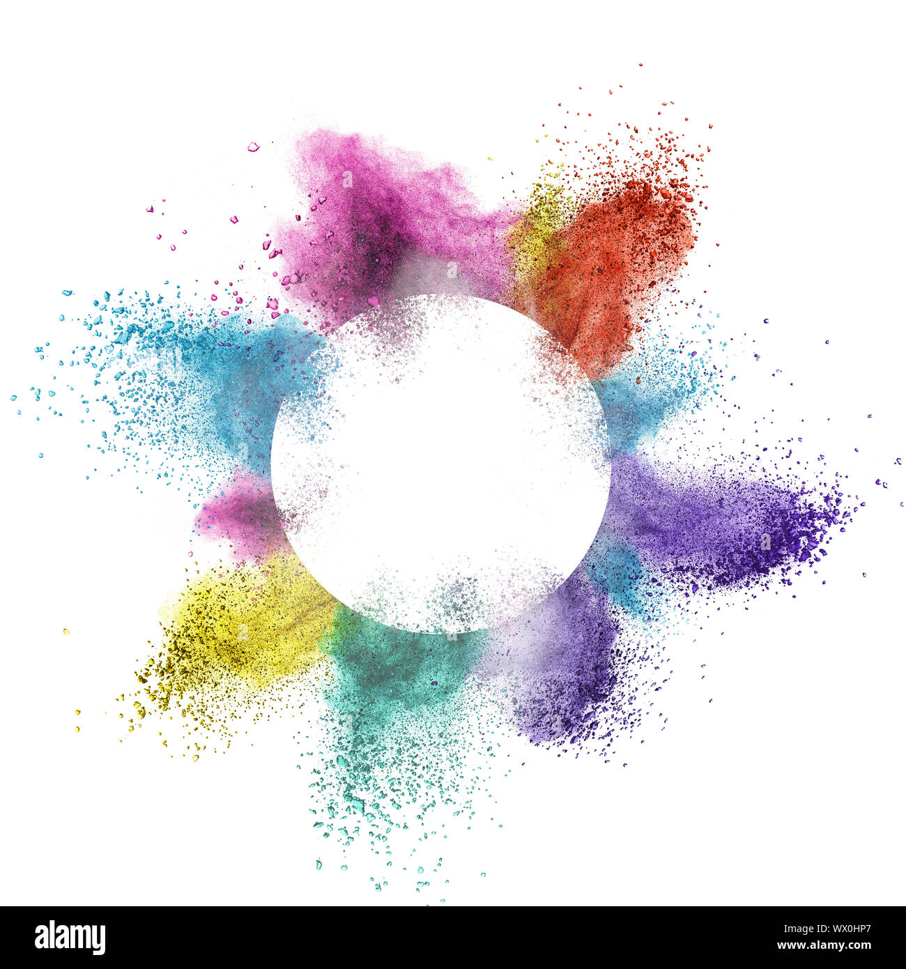 Abstract di polvere multicolore sbattuto dietro una cornice rotonda impazza su sfondo bianco Foto Stock