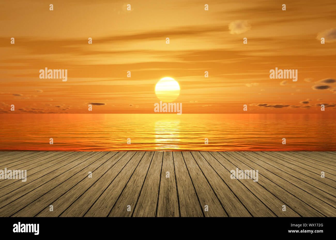 Un bellissimo tramonto dorato oltre oceano e un pontile in legno Foto Stock