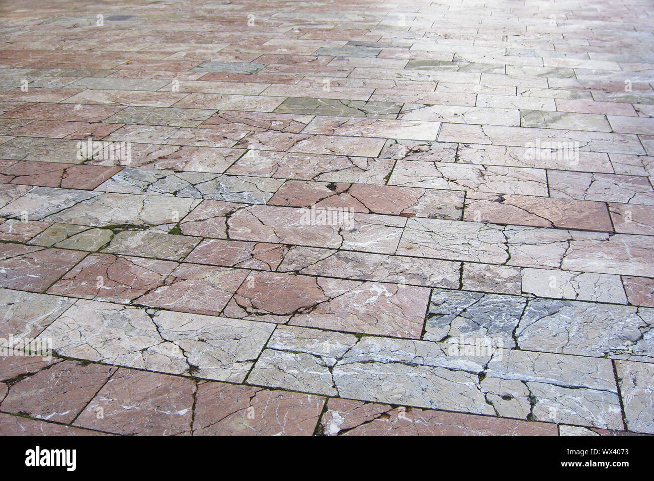 Vecchio rustico pavimentazione in marmo Foto Stock