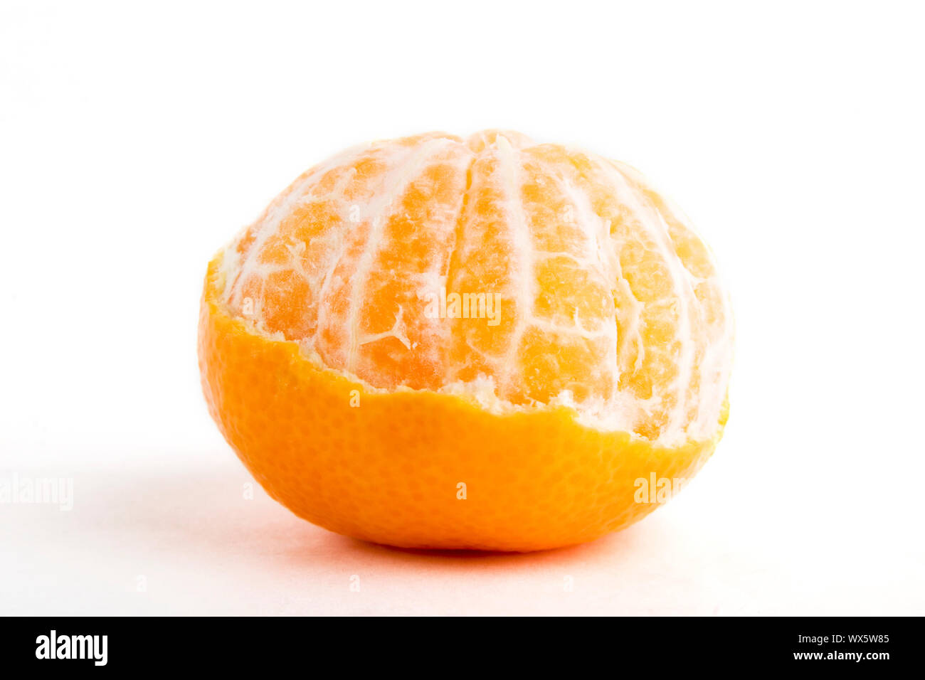Un parzialmente pelato arancione Foto Stock