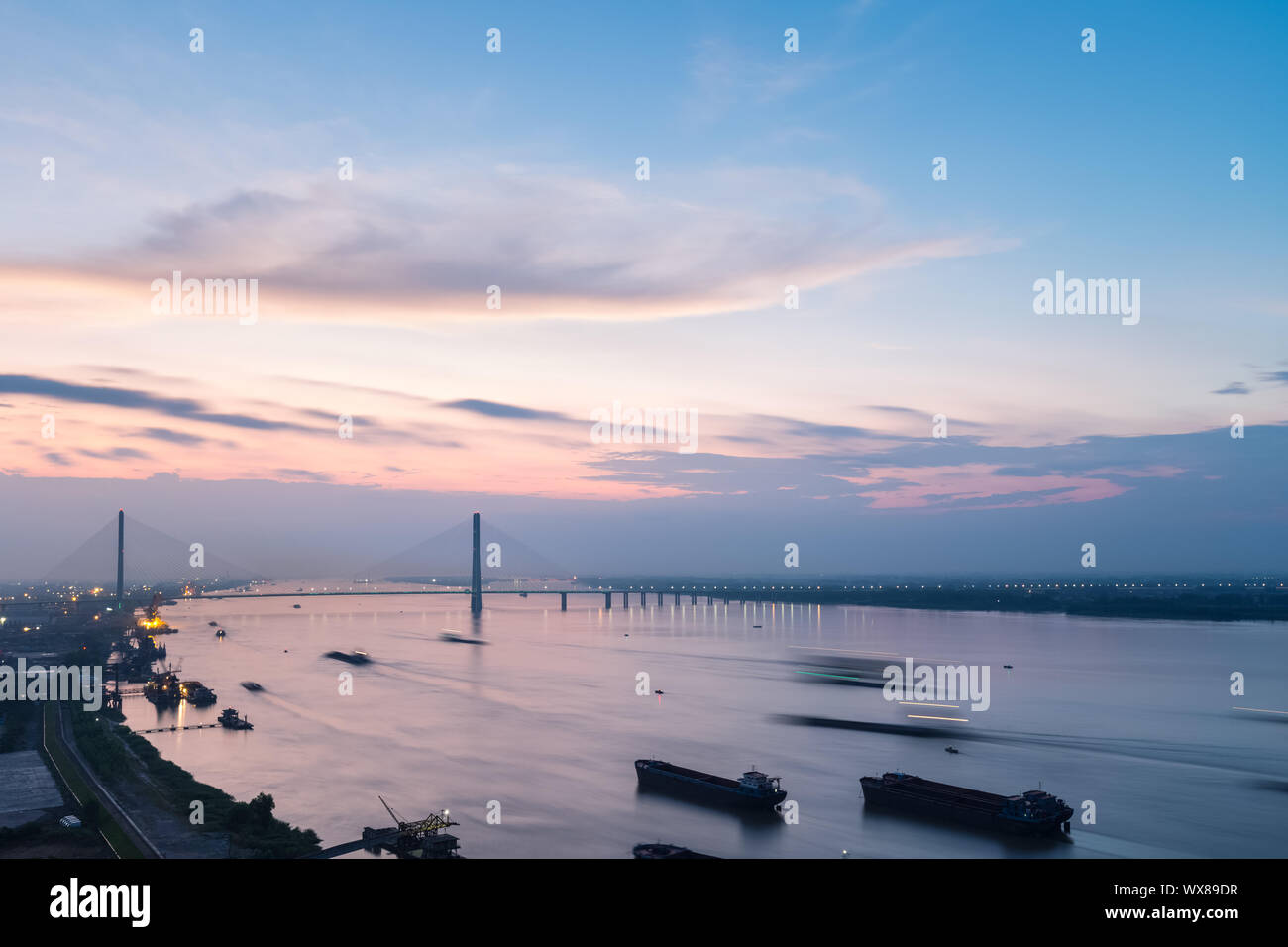 Cavo di jiujiang-ponte alloggiato in sunset Foto Stock