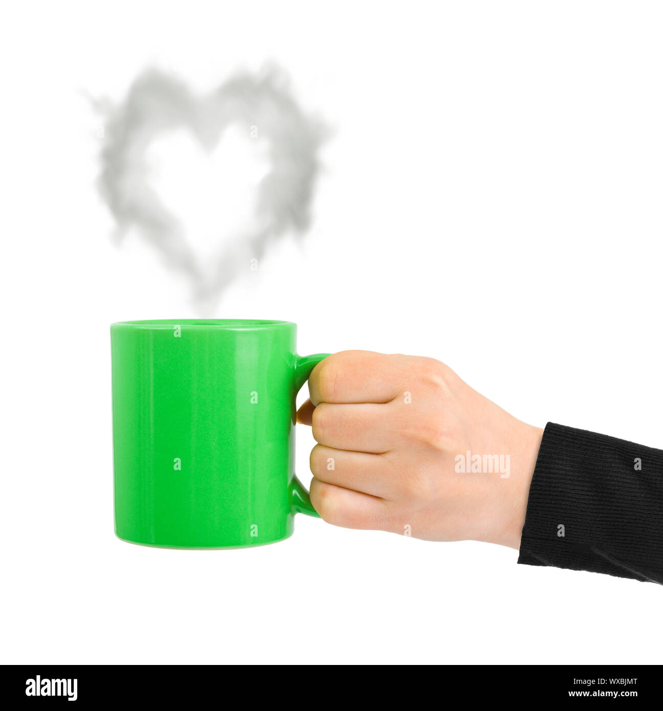 Mano con cup e il vapore come un cuore Foto Stock
