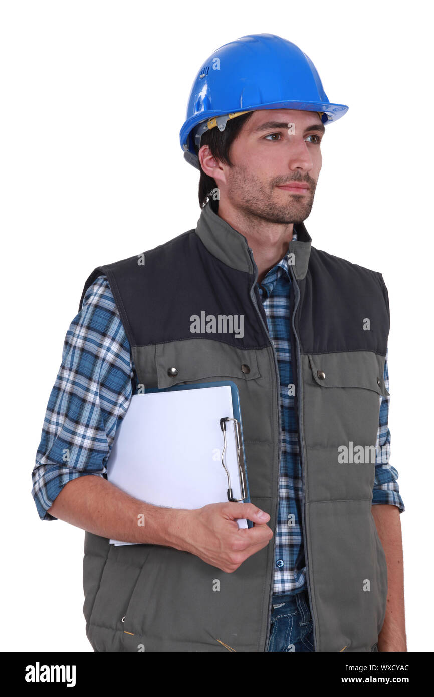 Artigiano con portafogli sotto le braccia Foto Stock