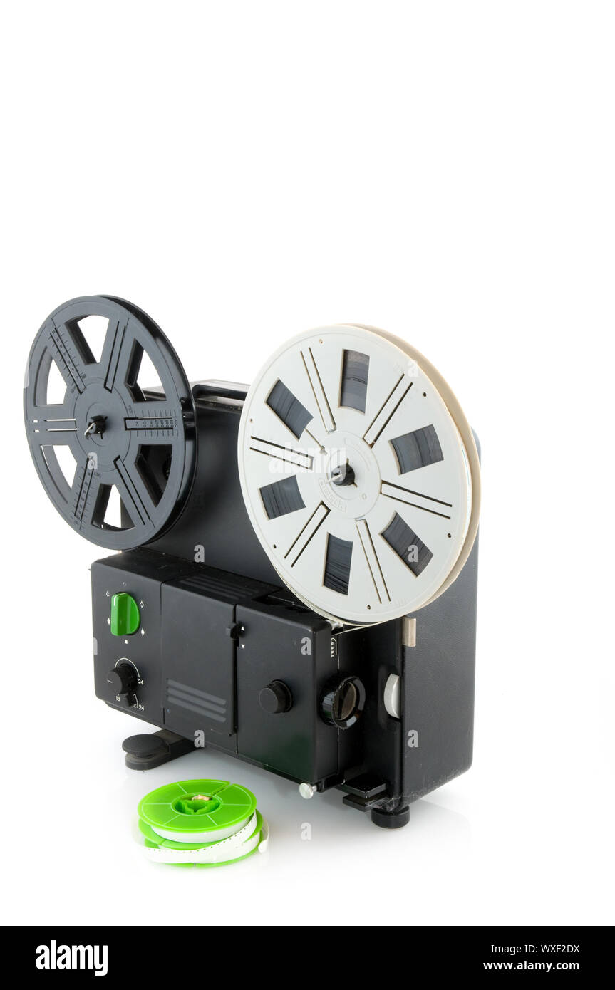 Proiettore analogico e bobine di film Foto stock - Alamy
