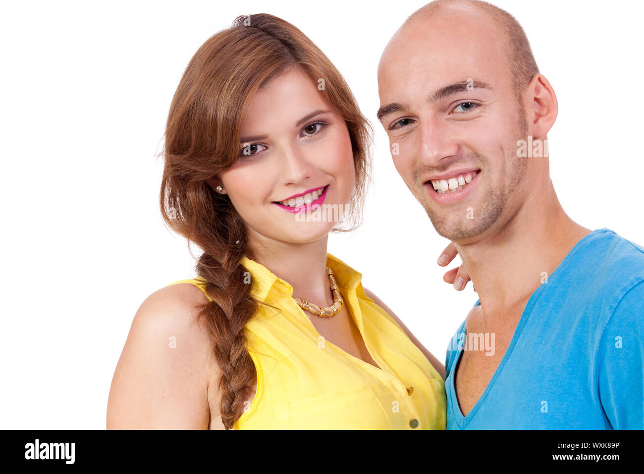 Giovane coppia sorridente in amore ritratto isolato Foto Stock