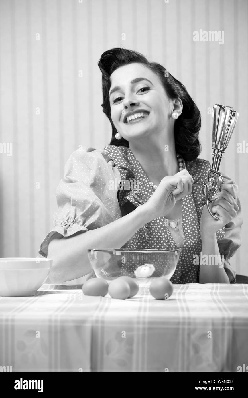 Vintage ritratto di una massaia in cucina Foto Stock