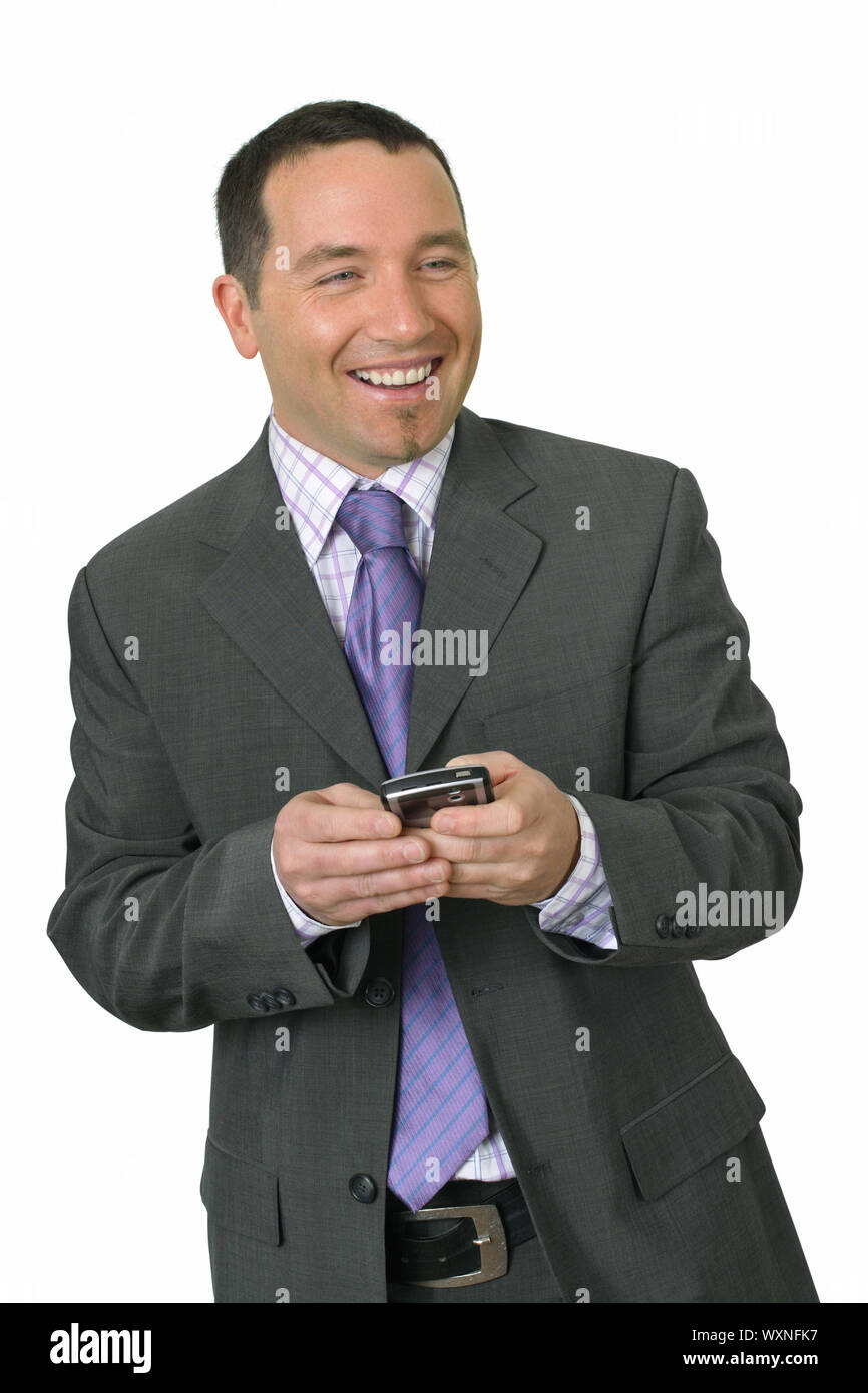 Imprenditore sorridente con PDA Foto Stock