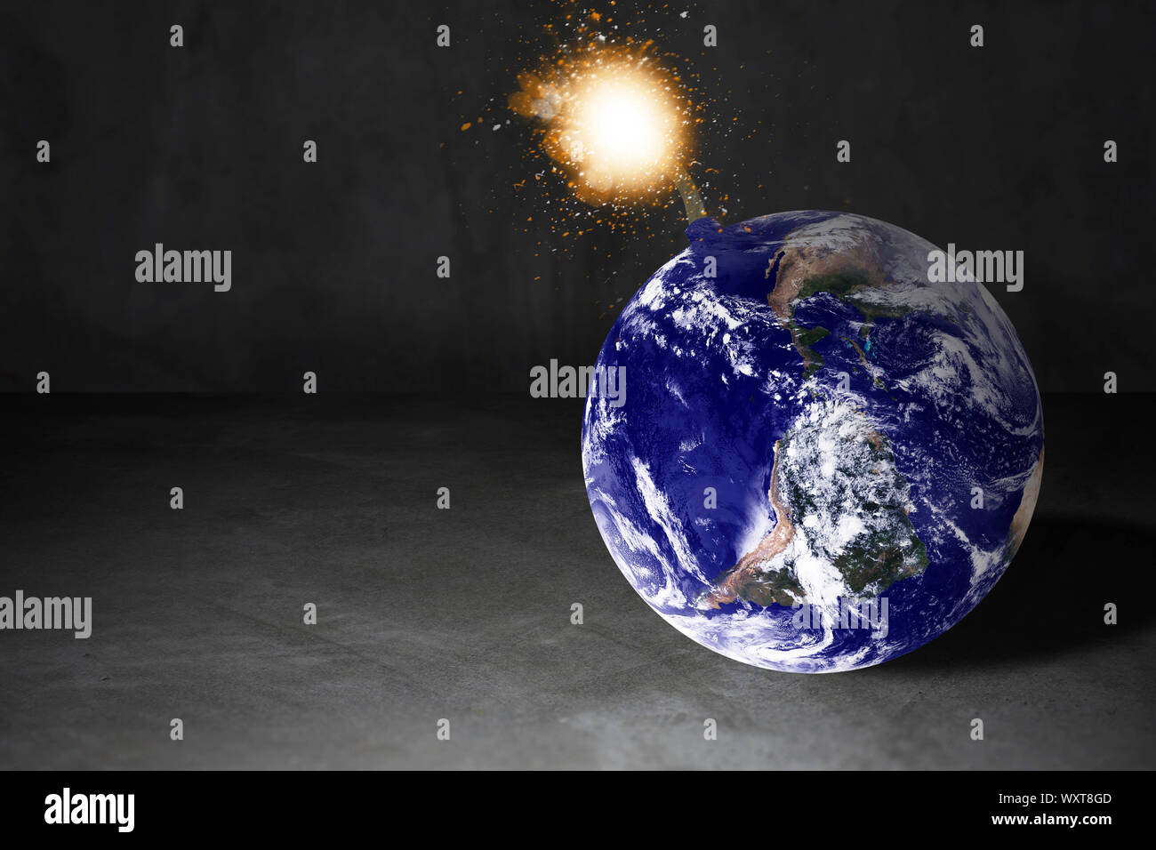 Crisi mondiale concetto, la bomba di messa a terra sullo sfondo, gli elementi di questa immagine fornita dalla NASA Foto Stock