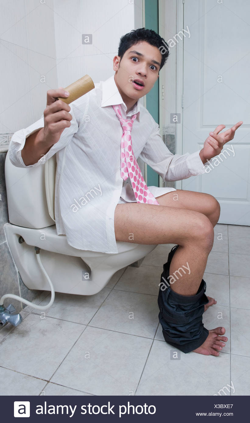 Uomo Seduto Su Un Wc E Gesticolando Foto Immagine Stock