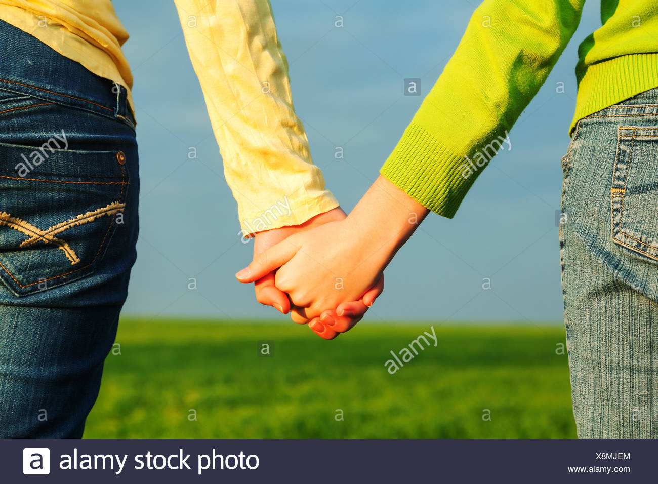hands holding teen Hands holding teen