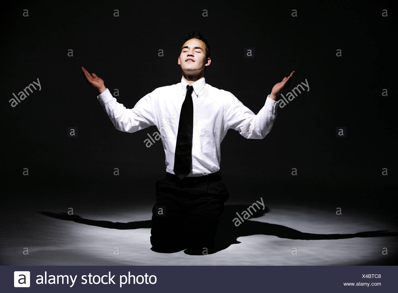 Man Praying On His Knees Images Stock Photos Vectors