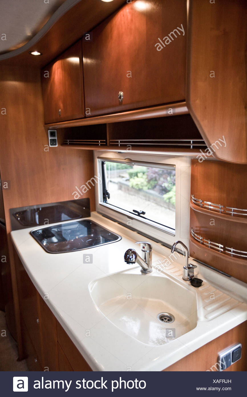 Sink And Hob At Window Of Concorde Luxury Motorhome Stock